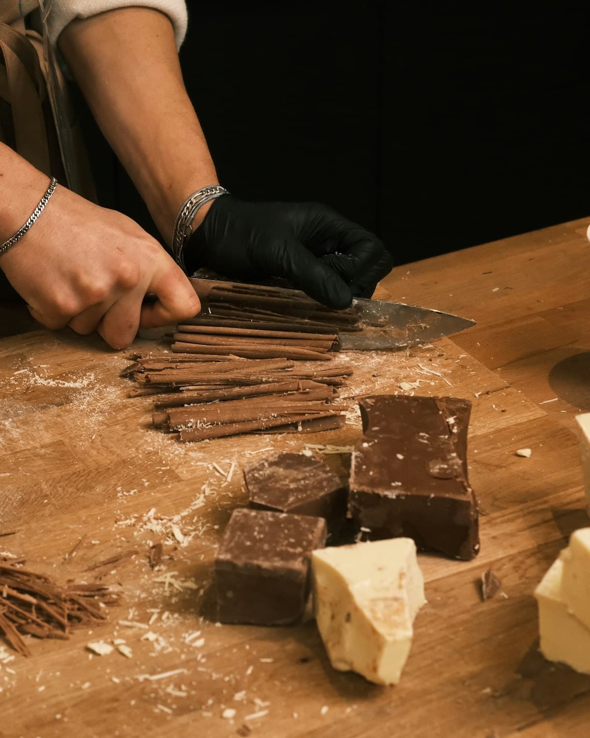 Master chocolatier at the marble tempering slab